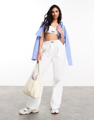 ASOS Weekend Collective woven pants with label in white ASOS Weekend Collective