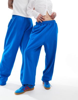 Свободные спортивные брюки унисекс среднего синего цвета COLLUSION Collusion