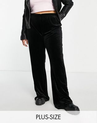 Pieces Curve high waisted velvet flared pants in black Pieces Plus