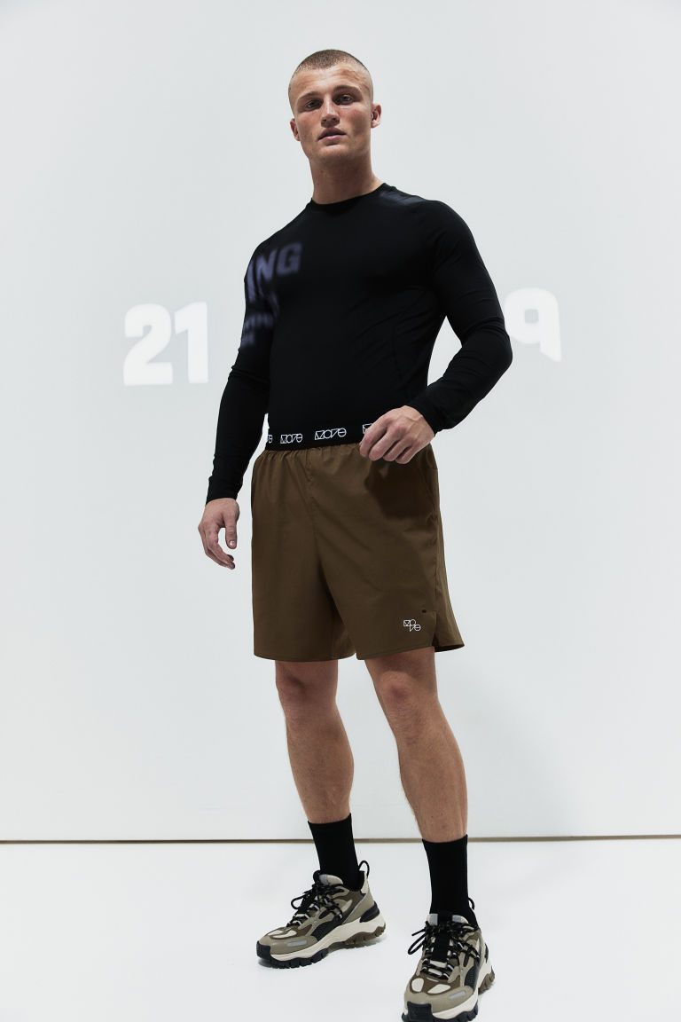 Спортивные шорты DryMove™ 2-в-1, тянущиеся в четырех направлениях H&M