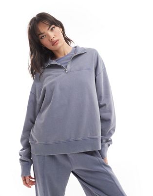 ASOS DESIGN oversized half zip sweatshirt in washed indigo blue ASOS DESIGN