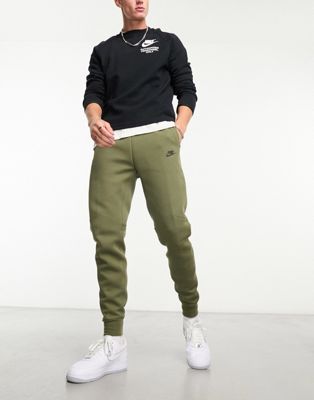 Оливковые спортивные брюки Nike Tech Fleece Nike