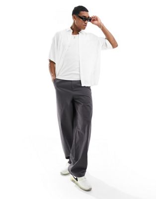 Белая трикотажная рубашка свободного кроя с короткими рукавами и пуговицей с логотипом Armani Exchange AX ARMANI EXCHANGE