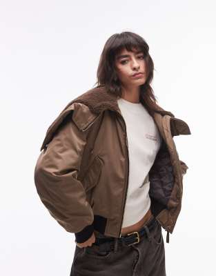 Mango borg detail short puffer coat in khaki MANGO