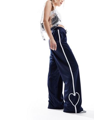 Monki heart stripe straight leg track pants in navy and white Monki
