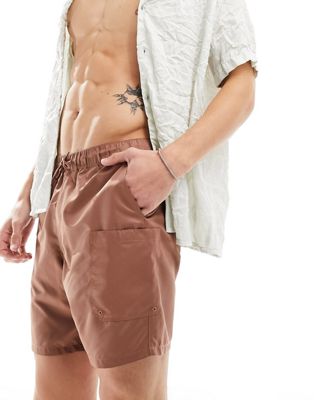 ASOS DESIGN swim shorts in mid length with cargo pocket detail in brown ASOS DESIGN