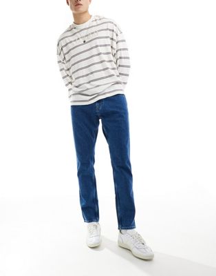 Tommy Jeans austin slim tapered jeans in mid wash  Tommy Jeans