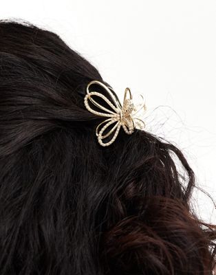 ASOS DESIGN hair claw with faux pearl butterfly design in gold tone ASOS DESIGN