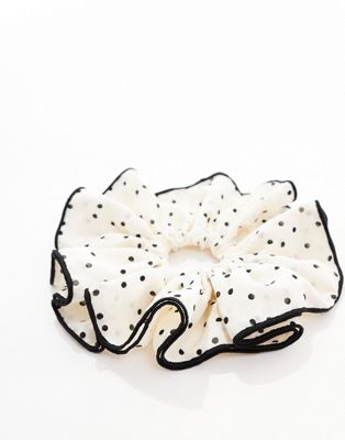 ASOS DESIGN hair scrunchie with oversized polka dot design ASOS DESIGN