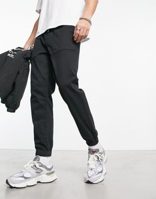 Черные рабочие брюки узкого кроя с манжетами Jack & Jones Intelligence Jack & Jones