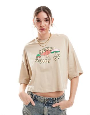 ONLY never grow up graphic cropped t-shirt in beige   ONLY