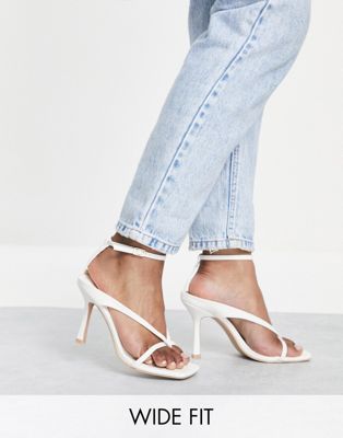RAID Wide Fit Meeka strappy mid heeled sandals in white Raid Wide Fit