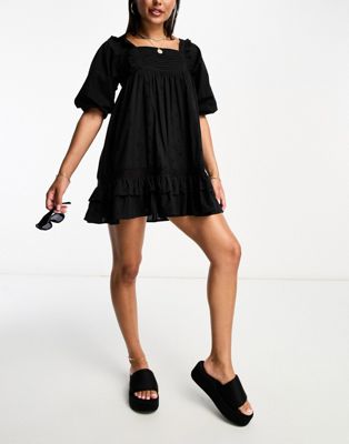 Черное пляжное пляжное мини-платье с объемными люверсами Iisla & Bird Iisla & Bird