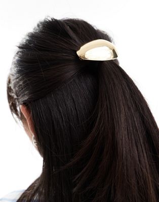 ASOS DESIGN barrette hair clip with oval abstract design in gold tone ASOS DESIGN