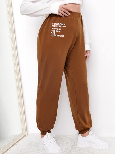 SHEIN размера плюс Спортивные брюки с текстовым принтом с эластичной талией SHEIN