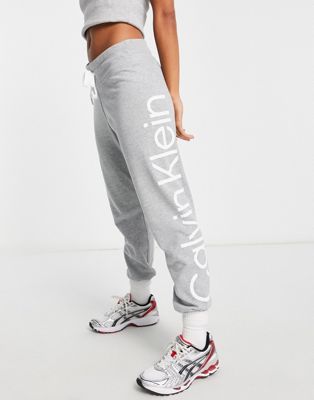 Серые спортивные штаны с манжетами и большим логотипом Calvin Klein Performance Calvin Klein