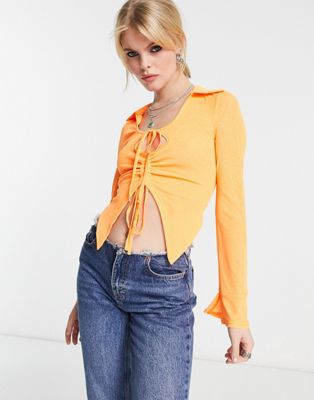 Annorlunda ruched mesh cut-out shirt in orange melon Annorlunda