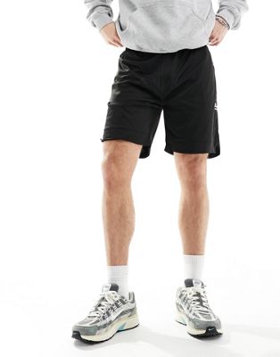The Couture Club varsity mesh shorts in black The Couture Club