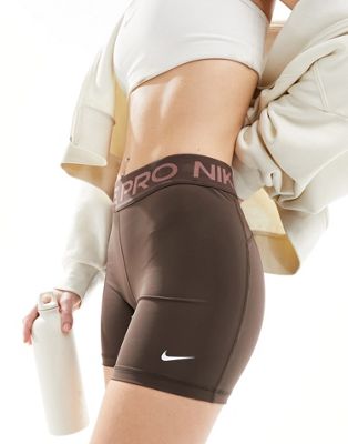 Nike training 365 5 inch shorts in dark brown Nike
