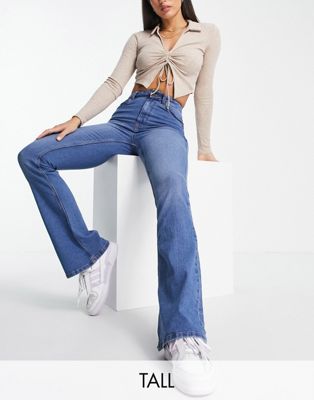 Pieces Tall Peggy high rise flared jeans in mid blue denim Pieces Tall