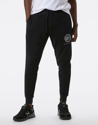 Черные зауженные спортивные брюки с логотипом New Balance Active New Balance