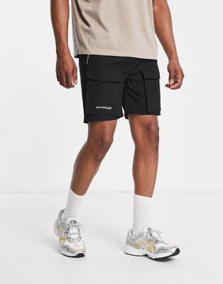 The Couture Club paneled cargo shorts in black The Couture Club