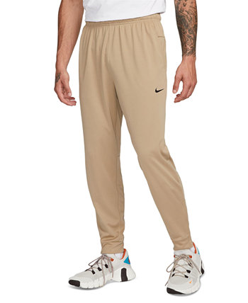 Мужские зауженные универсальные брюки Totality Dri-FIT Nike