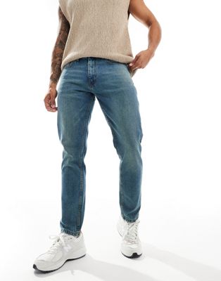 DTT rigid slim fit jeans in mid blue vintage tint Don't Think Twice