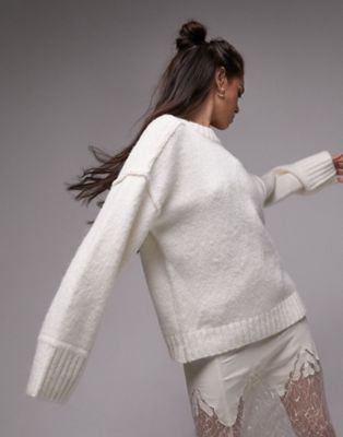 Вязаный свободный свитер с открытыми швами Topshop цвета слоновой кости TOPSHOP