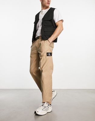 Бежевые функциональные брюки чинос прямого кроя Calvin Klein Jeans Calvin Klein