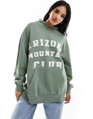ASOS DESIGN oversized hoodie with arizona mountain club applique graphic in khaki ASOS DESIGN