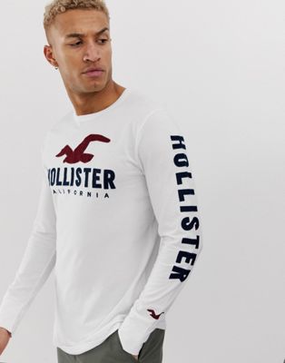 Белый топ с длинными рукавами и логотипом на груди и рукавах Hollister Hollister