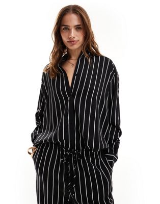 ASOS DESIGN relaxed shirt with linen in black stripe ASOS DESIGN