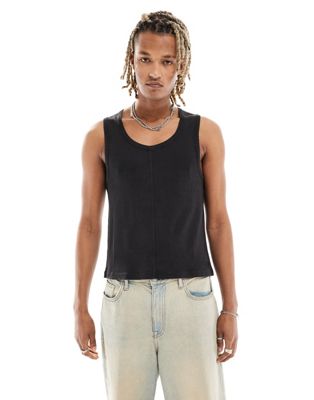 Reclaimed Vintage ribbed tank top with seaming detail in washed black  Reclaimed Vintage