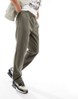 Прямые брюки цвета хаки с эластичной резинкой на талии ASOS DESIGN ASOS DESIGN