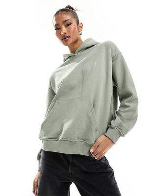 The Couture Club relaxed emblem hoodie in sage green The Couture Club
