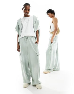 ASOS DESIGN unisex wide leg sweatpants with cargo pockets in washed green - part of a set ASOS DESIGN