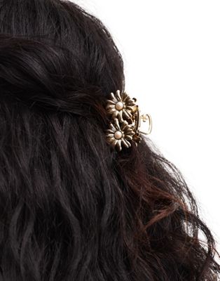 ASOS DESIGN hair clip claw with daisy and faux pearl design in gold tone ASOS DESIGN