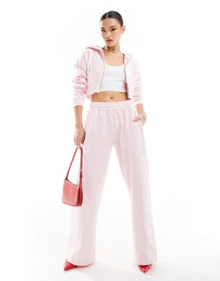 Эксклюзивные широкие спортивные штаны Murci розового цвета — часть комплекта Murci