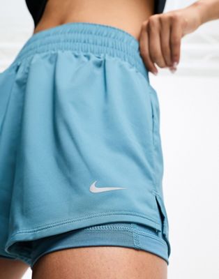Тренировочные шорты Nike Training One Dri-FIT 7.62 см (3 дюйма) 2в1 в синем цвете для женщин Nike