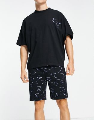 ASOS DESIGN lounge T-shirt and shorts pajama set with star sign print in black ASOS DESIGN