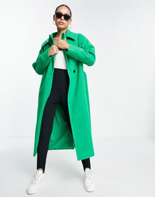 Annorlunda belted cocoon coat in grass green Annorlunda