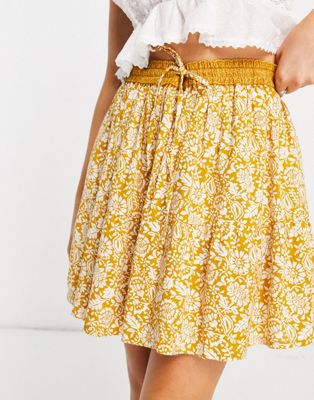 En Crème mini pleated skirt in yellow paisley with tie waist set En Crème