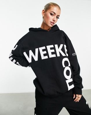 ASOS Weekend Collective hoodie with cut about graphic in black ASOS Weekend Collective