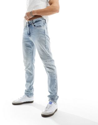 Calvin Klein Jeans slim tapered jeans in light wash Calvin Klein