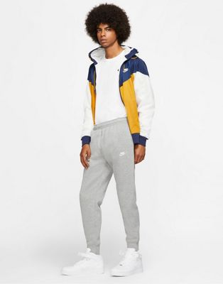 Серые спортивные штаны с манжетами Nike Club Fleece - Lgray Nike
