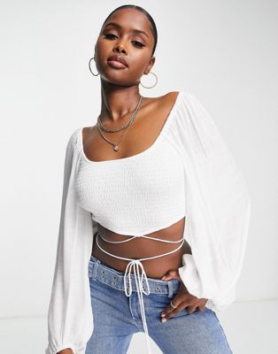 Parallel Lines crop top with strap detail and volume sleeve in white  Parallel Lines