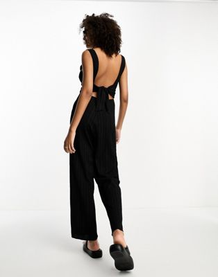 Lola May scoop back bow jumpsuit in black Lola May