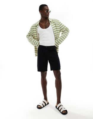 ASOS DESIGN pleated regular length linen shorts with fixed waist in black ASOS DESIGN
