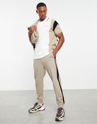 Светло-коричневые спортивные брюки с полосками по бокам Armani Exchange SUIT 5 AX ARMANI EXCHANGE